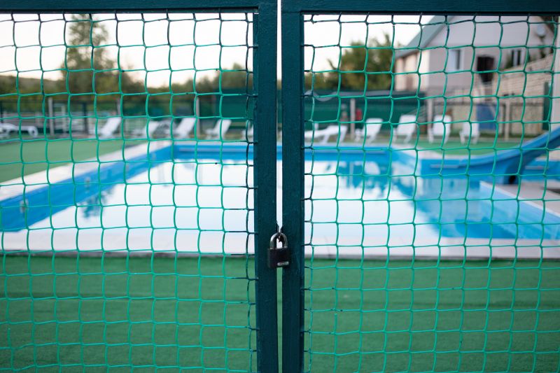 Mesh Fence Securing Pool